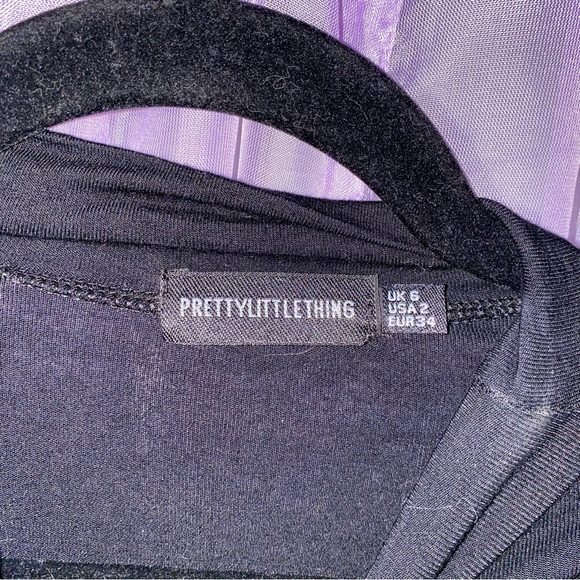 PrettyLittleThing Black Mock Neck Long Sleeve Crop Top with Hip Slits - Picture 4 of 4